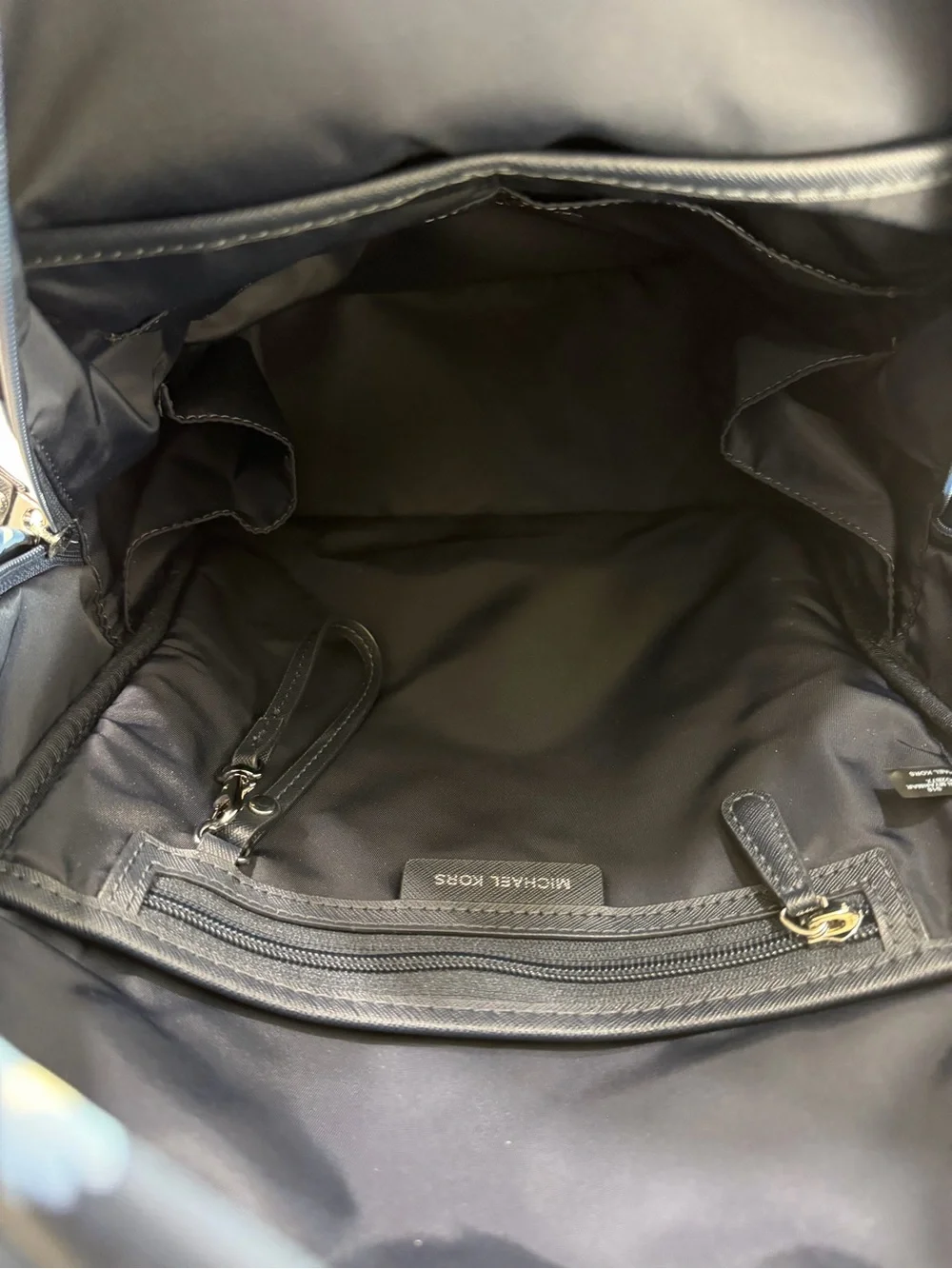 Michael Kors Navy Floral Mini Backpack with Teal and Light Blue Accents